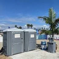 Rows of standard portable toilet units ready for deployment